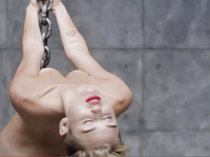 Miley Cyrus Tits Porn - Miley Cyrus naked Wrecking Ball video smashes Vevo records - Mirror Online