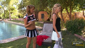blonde lesbian cheerleaders - Two sexy blonde cheerleaders have lesbian sex by the pool | Any Porn