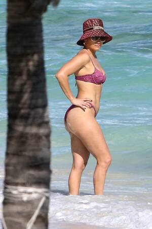 Jennifer Lopez Ass Porn Captions - JLo, 51, shows off six-pack abs in a purple bikini as she hits the beach  with fiance ARod | The US Sun
