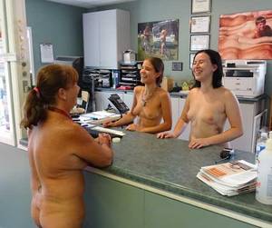 fat nudist colony - Staff members at the front desk in the office at Bare Oaks Family Naturist  Park