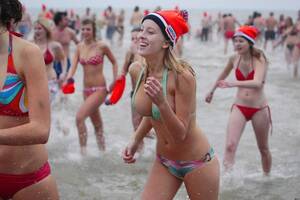 norway nude beach clips - Disturbing image from the New Year's dive in the frigid North Sea of  Holland. : r/pics