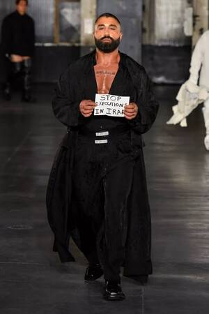 Louis Anderson Gay Porn - Gay Porn Star Sharok Walks The Runway At Paris Fashion Week Holding â€œStop  Executions In Iranâ€ Sign