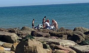 island nude beach - Boat full of migrants lands on nudist beach - and naked sunbathers offer  them hot drinks | The US Sun