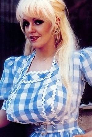 Anne Marie Big Tits - Whilst her exact measurements elude me, there's no denying that Ann Marie's  eye-popping 67 inch bust is a sight for sore eyes, made all the more  impressive ...