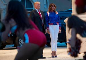 Football Super Bowl Porn - Melania wore tight white trousers and a silk blue football jacket
