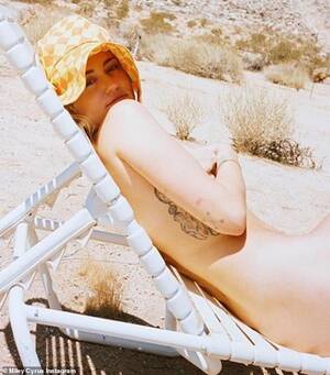 Miley Cyrus Porn Captions - Miley Cyrus poses nude in the desert as she says she can't wait for summer  | Daily Mail Online