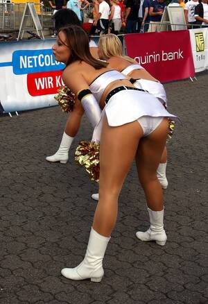 cheerleader upskirt on bus - Cheerleader showing Upskirt in Tan Nylon Pantyhose, Miniskirt and Boots
