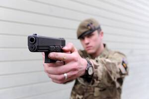 Military Porn Models - A soldier from the Princess of Wales Royal regiment models the British  Army's new sidearm; the Glock 17 [X-Post Military Porn] : r/Glocks