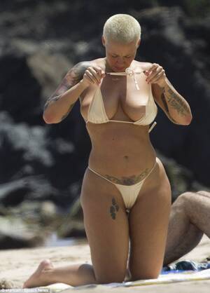 Hawaiian Beach Sex - Topless Amber Rose suns herself in a thong bikini on Hawaiian beach getaway  | Daily Mail Online
