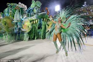 Mini Carnival Porn - Her green and silver outfit had 12,000 crystals glued to it and almost 500  pheasant feathers