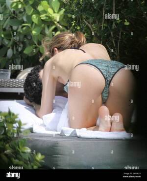 Melissa Theuriau Sex - French actor Jamel Debbouze and wife Melissa Theuriau enjoy a day in the  sun wearing bathing suits at their exclusive Miami Beach hotel pool. The  couple had lunch and were very intimate