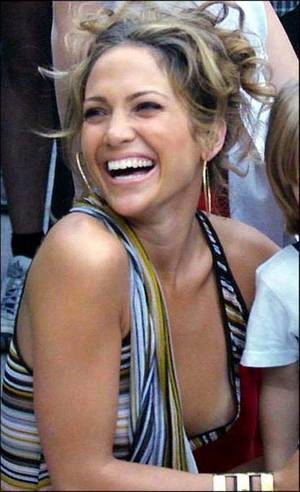 jennifer aniston down blouse upskirt - Jennifer Lopez showing off one of her Jenny on the Blocks? What a beautiful  smile.