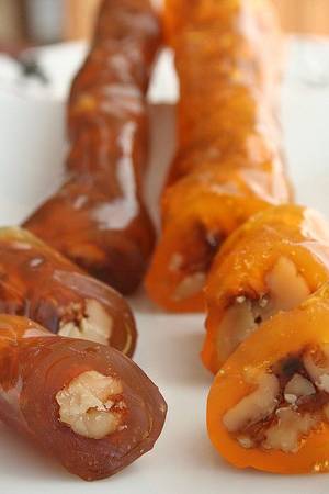 Ayagi Azeri - A tradition on Armenian Christmas is rojik (or qozlu sucuk in Azerbaijani),  a Caucasian dessert of walnuts and grape molasses. under a Creative Commons  ...