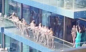 bare nudist - Dubai to Deport Russian, Ukrainians Caught in Nude Balcony Photoshoot - The  Moscow Times
