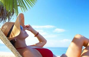 best sunbathing beach - 5 Steamy beach reads â€“ SheKnows