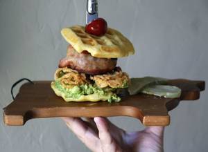 Burger Shop Porn - Colossal Burger: bacon wrapped burger, onion rings, guacamole and a  cornmeal waffle