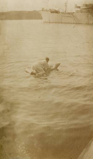 drunk russian at the beach - From my Great Granddad's war album. Apparently this submariner fell asleep  black-out drunk and woke up floating on the water. Helsingfors (now  Helsinki), Russian Empire, 1918. [987x1686] : r/HistoryPorn