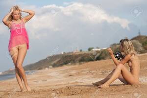 beach nude girls - Naked Girl Photographer Beach, Black Sea Stock Photo, Picture and Royalty  Free Image. Image 17381091.