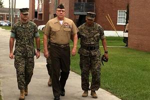 Marine Wife Hidden Porn - Daniel Wilson, center, was fired as operations officer for II Marine  Expeditionary