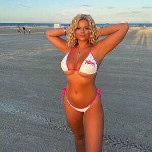 naked beach tan body - Page 3 babe gets 'hot' at the beach as she tops up her tan in tiny swimsuit  - Daily Star