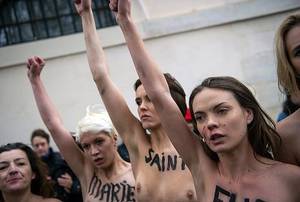 Asylum - Activists of the Ukrainian feminist group Femen continue their protest  after having been chased and beaten