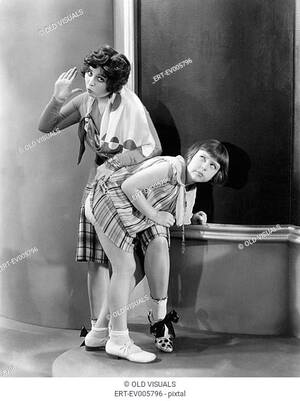 adult classroom spanking - Teacher spanking a girl in a classroom All persons depicted are not longer  living and no estate..., Stock Photo, Picture And Royalty Free Image. Pic.  ERT-EV005796 | agefotostock