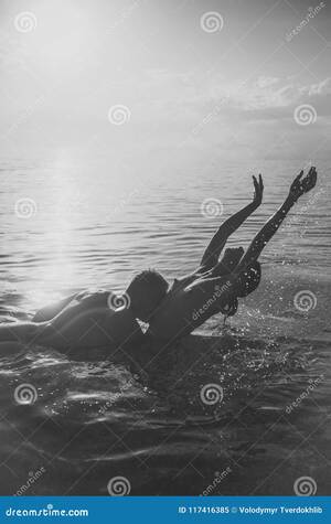 couples topless beach boobs - Prelude - Couple in Love. Wet Lady with Nude Breasts and Lover Swimming in  Sea at Sunrise Stock Image - Image of concept, nude: 117416385