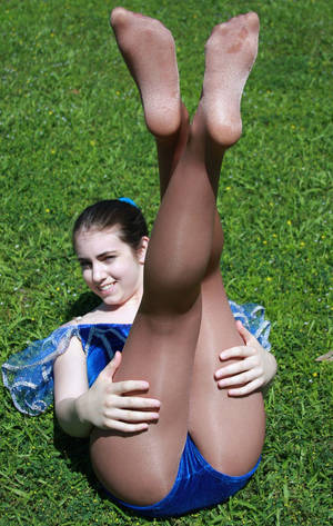 cheerleader feet cum - Genuine cheerleader posing for a naughty shot