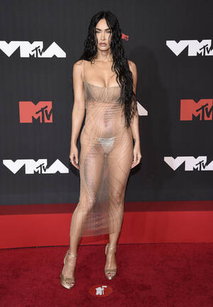 Megan Fox Boobs Porn - The VMAs' most shocking nearly-naked looks with Rose McGowan's chain dress, Megan  Fox's sheer look and Lil Kim's pasties | The US Sun