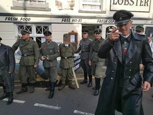 1940s Uniform Porn - Men dressed as Nazi SS clash with furious locals as cops escort them off  high street during Sheringham 1940s weekend | The Sun