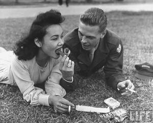 1940s Japanese Whores Porn - US soldier and local girl sharing a chocolate bar and cigarettes, Japan  1946 [1280 x 1034] : r/HistoryPorn