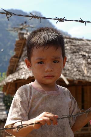 Nepali Refugees Porn - A Karean boy in Maela refugee camp in Thailand, near border of Myanmar. This