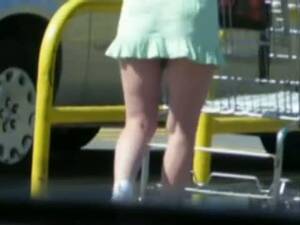 accidental upskirt parking lot - Good looking teen in accidental up skirt shot in a parking lot