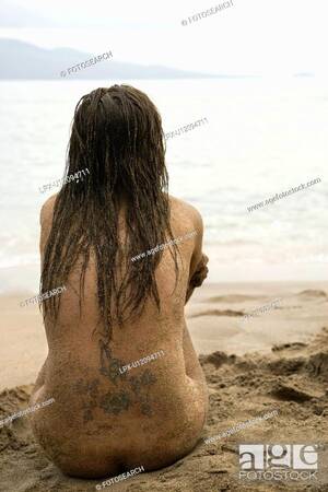 adult beach nudist image gallery - Rear view of Caucasian young adult nude woman sitting on beach, Stock  Photo, Picture And Royalty Free Image. Pic. LPX-U12094711 | agefotostock