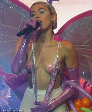 Mature Pussy Miley Cyrus - Miley Cyrus fails to protect her modesty as she shows off her butterfly  nipple pasties under a daring monokini ensemble at the Adult Swim Upfront  Party | Daily Mail Online