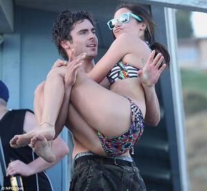 ashley tisdale on nude beach - Ashley Tisdale gets a piggy-back from Zac Efron as they have fun in the  California sun | Daily Mail Online