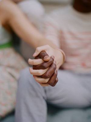 interracial couples holding hands - Interracial couple holding hands. Love. \