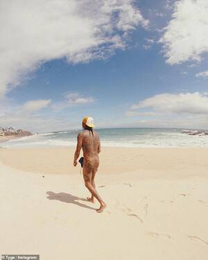 naked beach instagram - Tyga goes completely NUDE in new beach snap and shares shady message to his  haters: 'My presence is a present... kiss my a**' | Daily Mail Online