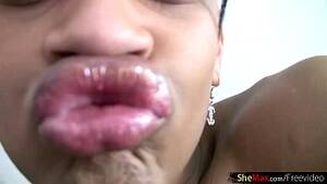 ebony pov lips - Ebony T-girl with big lips gets her black cock jerked in POV - XVIDEOS.COM