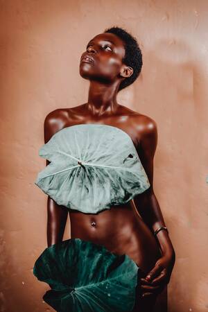 free black nude models - Slender black nude woman in bright room Â· Free Stock Photo