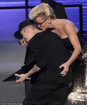 Justin Bieber Booty Porn - American Music Awards 2012: Justin Bieber gets nuzzled on stage by maneater  Jenny McCarthy | Daily Mail Online