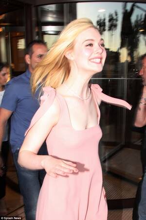 Elle Fanning Porn Galleries - Cannes 2017: Elle Fanning is caught off guard by the wind | Daily Mail  Online