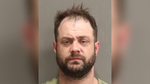 arrested - Police: Man wanted for child porn-related charges tackled and arrested