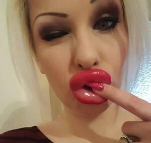 fake lips - Enormous 'porn star lips' on show in terrifying gallery of selfies | The Sun