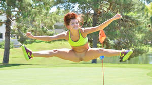 golf course - FTV Fiona doing a mid air split jump, spreading pussy on a gold course.