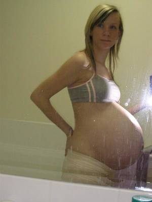 interracial pregnant belly - Pregnancy Â· Triplets
