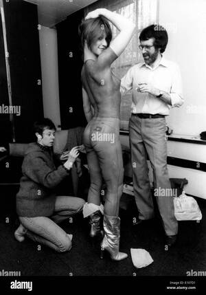 Marilyn Chambers Porn - Porn star Marilyn Chambers gets clothes painted on Stock Photo - Alamy