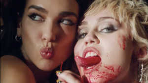hot lesbian xxx miley cyrus - Miley Cyrus and Dua Lipa Team Up for Steamy, Trashy 'Prisoner' Video
