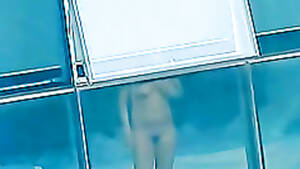 naked in window voyeur - Naked amateur stands in front of the window | voyeurstyle.com