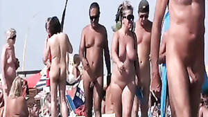 naughty nudist couple - Couples get naughty at the nude beach | voyeurstyle.com